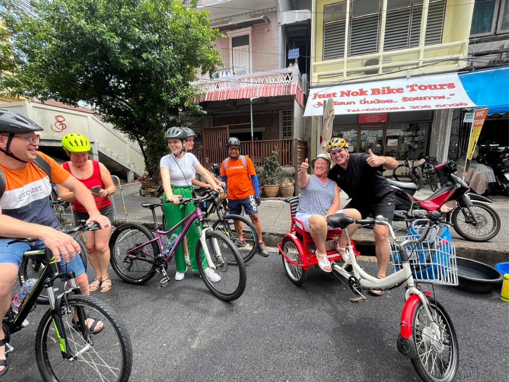 Cyclists at the starting point of the Bangkok Wonders and Mysteries full-day bike tour