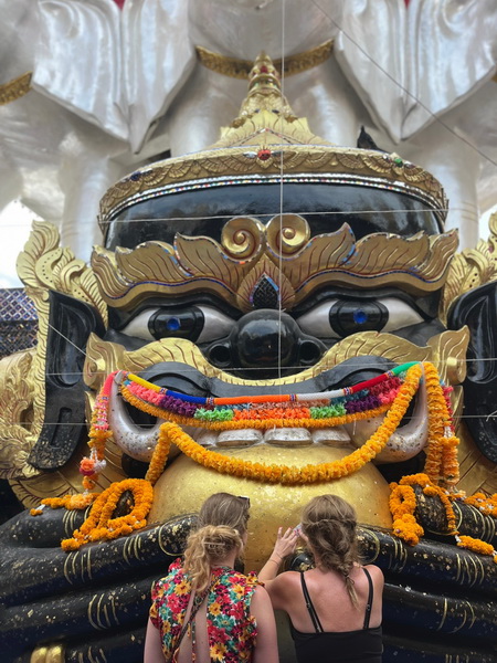 Guardian statue at Wat Paknam Phasi Charoen temple in Bangkok