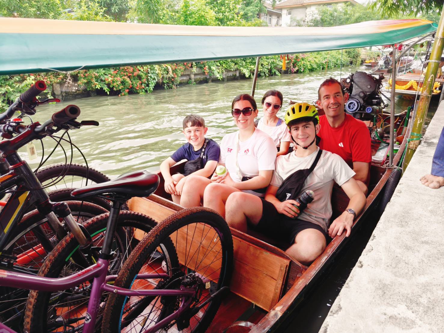 Longtail boat ride through Bangkok's old canals returning from Khlong Lat Mayom floating market