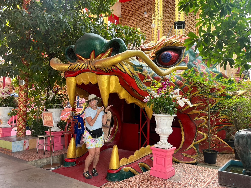 Giant reclining Buddha statue at Nonthaburi temple visited on canal tour